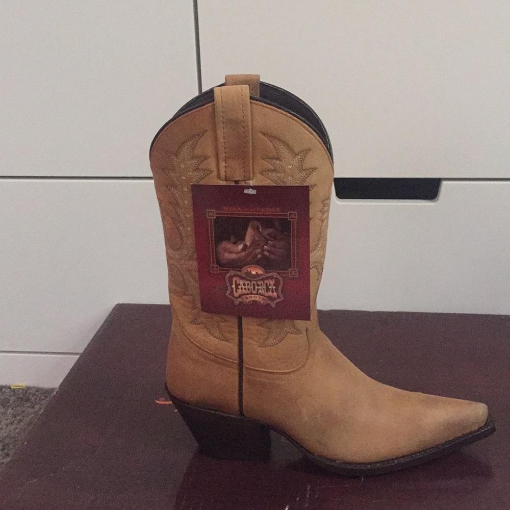 Real leather boots with box. New, never worn.
